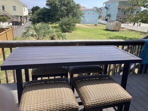 Outdoor dining - Comfy home, 3rd row, step from the beach! (Oak Island)