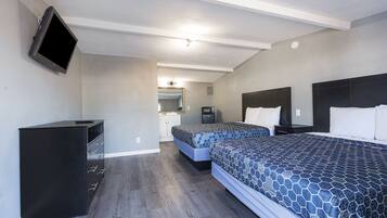 Room, 2 Queen Beds | In-room safe, iron/ironing board, free WiFi, bed sheets