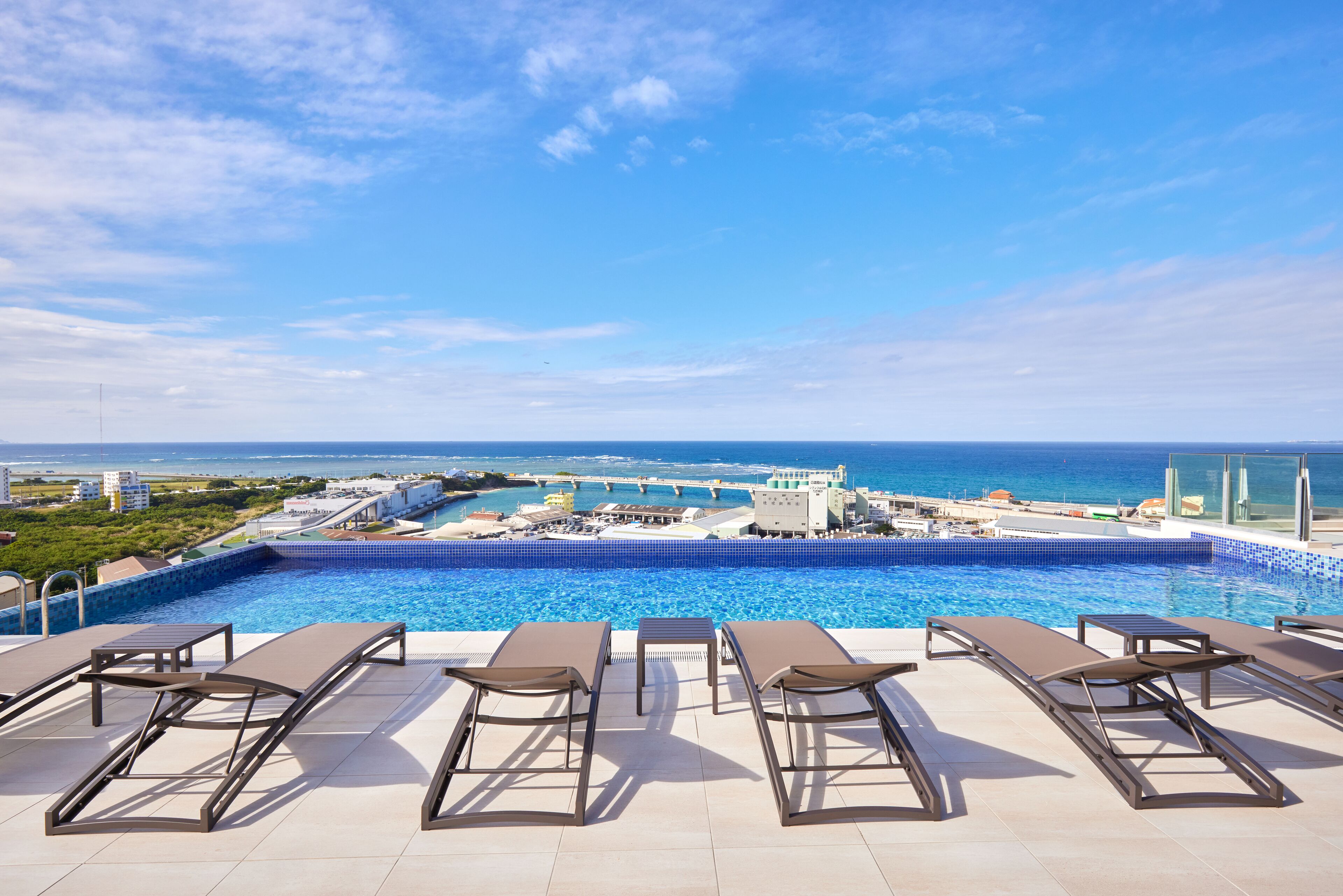 Seasonal outdoor pool, pool umbrellas, sun loungers