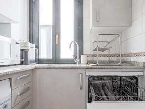 Fridge, microwave, coffee/tea maker, toaster