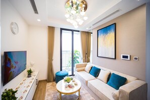 City Apartment | Living area | 47-inch Smart TV with satellite channels, TV - Canh Apartment in Vinhomes Green Bay  (Hanoi)
