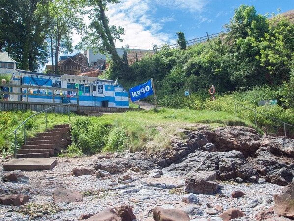 A blue and white building with a sign that reads "M3D". - Egret (Brixham)