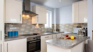 Fridge, dishwasher, toaster, cookware/dishes/utensils