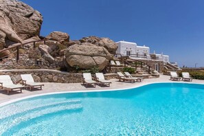 Relax by the pool surrounded by scenic views of the surrounding landscape.