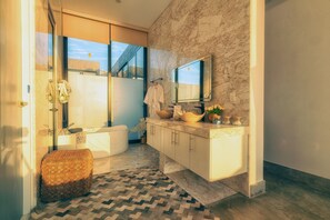 Bathtub, jetted tub, hair dryer, towels