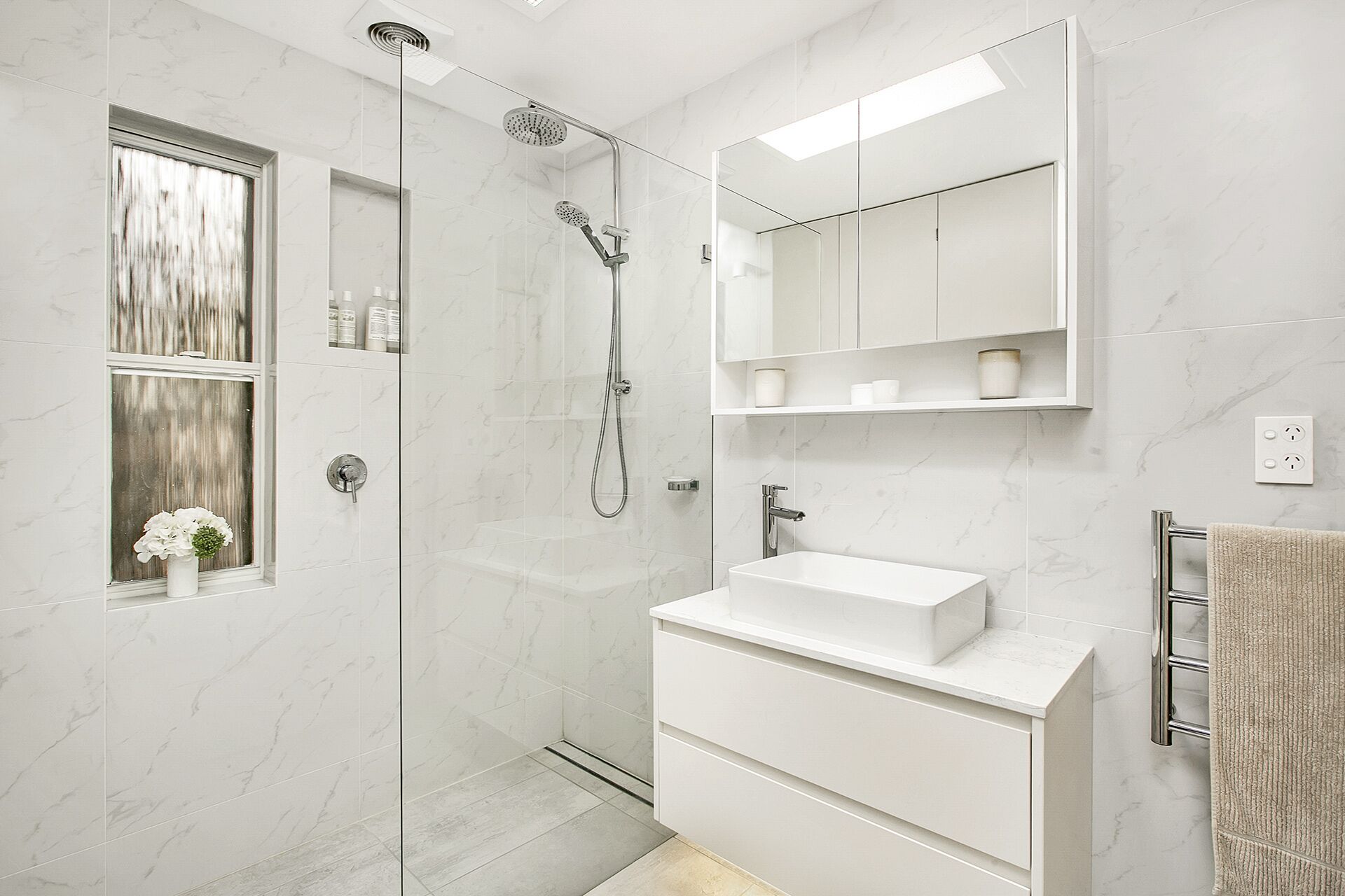 Shower, hair dryer, towels, toilet paper