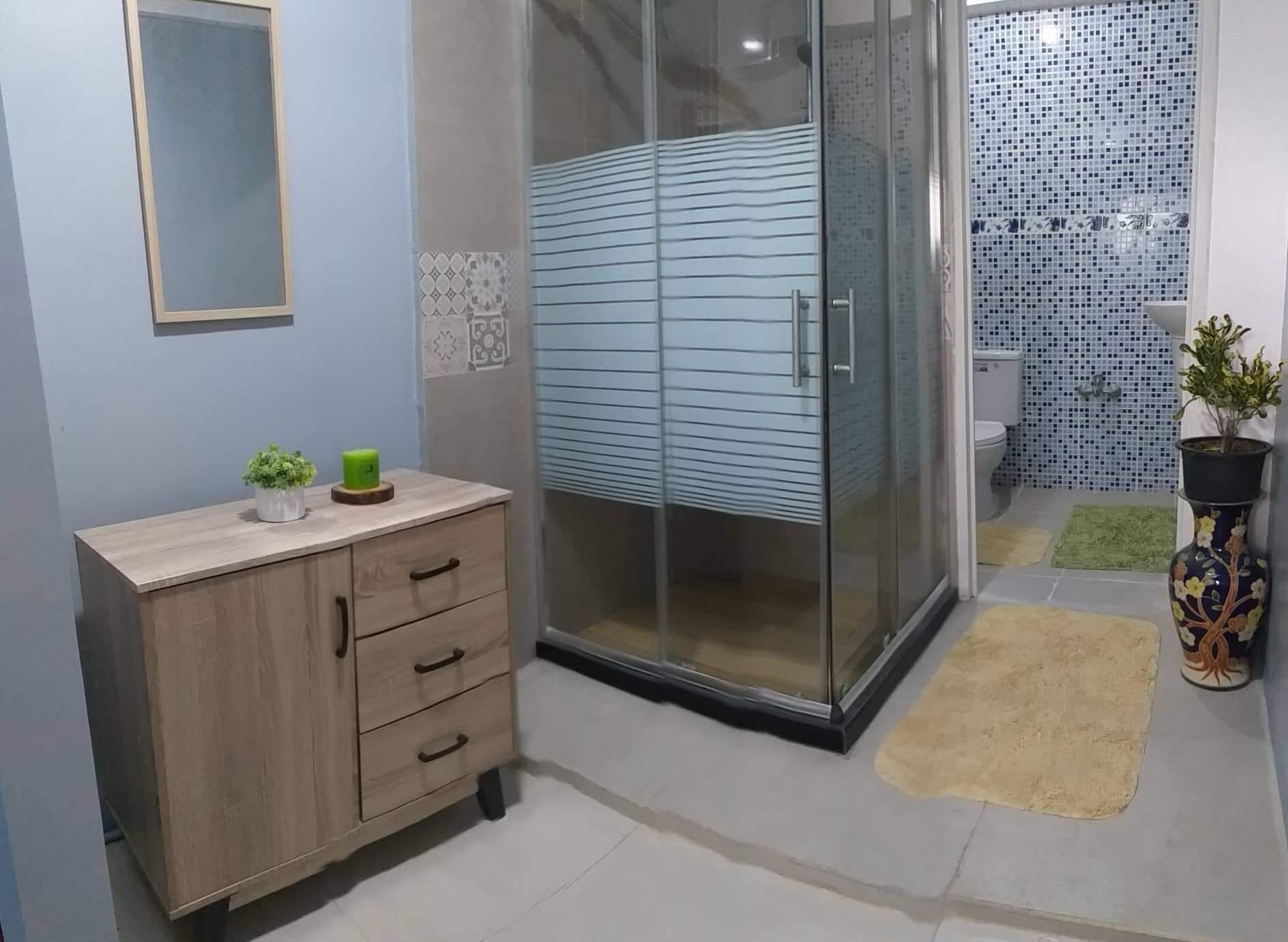 Shower, towels, soap, shampoo