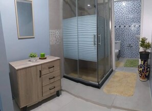 Shower, towels, soap, shampoo