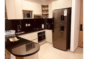 Fridge, microwave, oven, stovetop