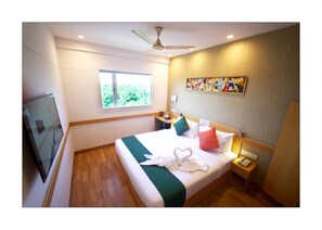 Chambre Prestige | Literie de qualité, lit avec matelas en mousse à mémoire, coffre-fort