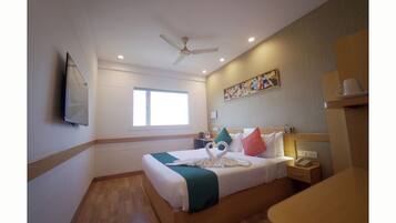 Premium Room | In-room safe, desk, laptop workspace, blackout drapes