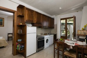 Fridge, oven, dishwasher, dining tables