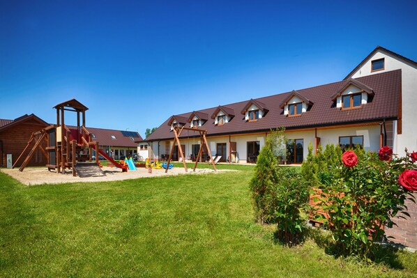 Exterior - Duplex apartments 300 m from the sea. Living room, 2 bedrooms, own terrace. (Darlówko)