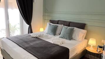 Apartemen Keluarga | Selimut bulu angsa, tirai kedap cahaya, dan setrika/meja setrika