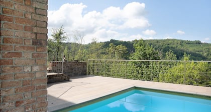 Maison de vacances 'La Corte di Langa Alloggio Rubino' avec piscine partagée et Wi-Fi