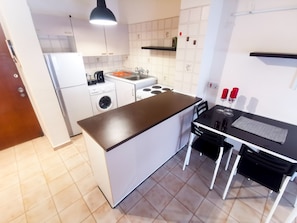 Standard Apartment | Private kitchen | Fridge, oven, stovetop, electric kettle