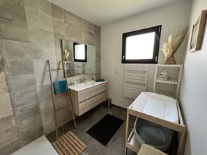 Shower, hair dryer, towels, soap
