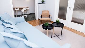 Comfort Apartment | Living area | Flat-screen TV