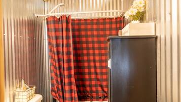 Combined shower/bathtub, hair dryer, towels, soap