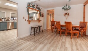 Enjoy meals in this dining area with a large table and comfortable seating for six.