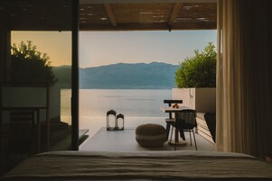 Special Offer - Seafront Suite | Living area | 50-inch Smart TV with digital channels, TV