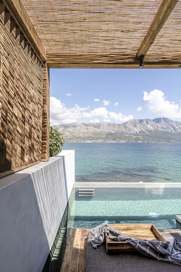 Special Offer - Seafront Suite | Living area | 50-inch Smart TV with digital channels, TV - Amethyst Selene Paleros (Aktio-Vonitsa)