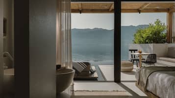 Seafront Suite with Private Heated Pool | Premium bedding, minibar, in-room safe, individually decorated