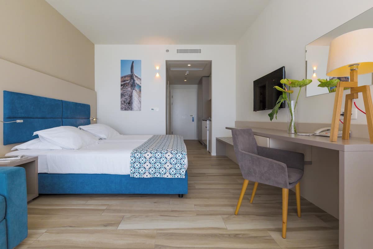 Studio with Balcony | Down comforters, memory foam beds, in-room safe, desk