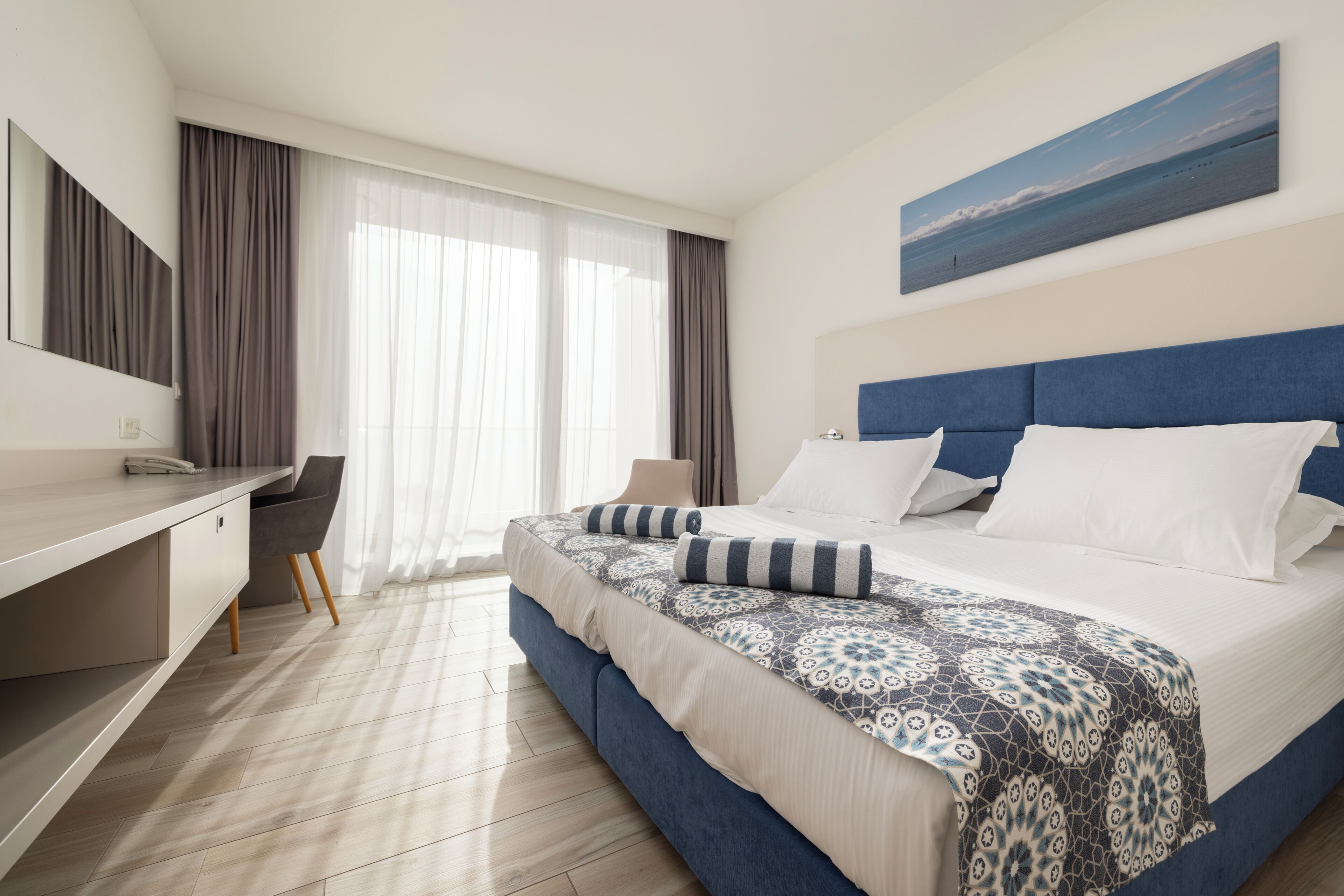 Deluxe Two-Bedroom Apartment with Sea View | Down comforters, memory foam beds, in-room safe, desk