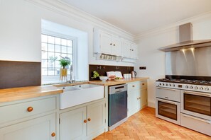 Oven, dishwasher, highchair, cookware/dishes/utensils