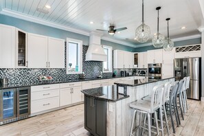 Fridge, microwave, oven, stovetop - Luxury 6 Bedroom Gulf View House w/ Private Pool, Firepit and more! (Pensacola Beach)