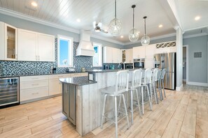 Fridge, microwave, oven, stovetop - Luxury 6 Bedroom Gulf View House w/ Private Pool, Firepit and more! (Pensacola Beach)