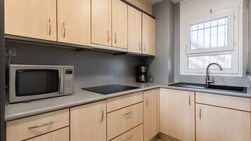 Fridge, microwave, coffee/tea maker, toaster