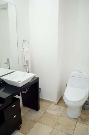 Bathtub, hair dryer, towels, soap