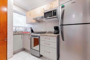 Fridge, microwave, oven, stovetop