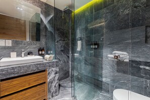 Bathtub, hair dryer, towels, soap