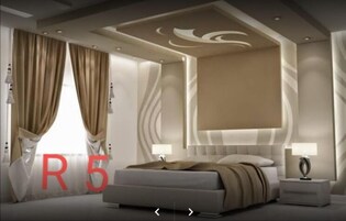 Tabla de planchar con plancha, wifi gratis y ropa de cama