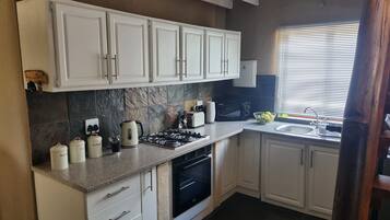 Family House | Private kitchen | Fridge, microwave, oven, stovetop
