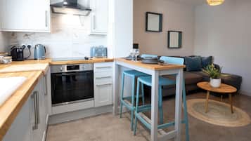 Apartamento, acessível, banheiro privativo | Cozinha compartilhada