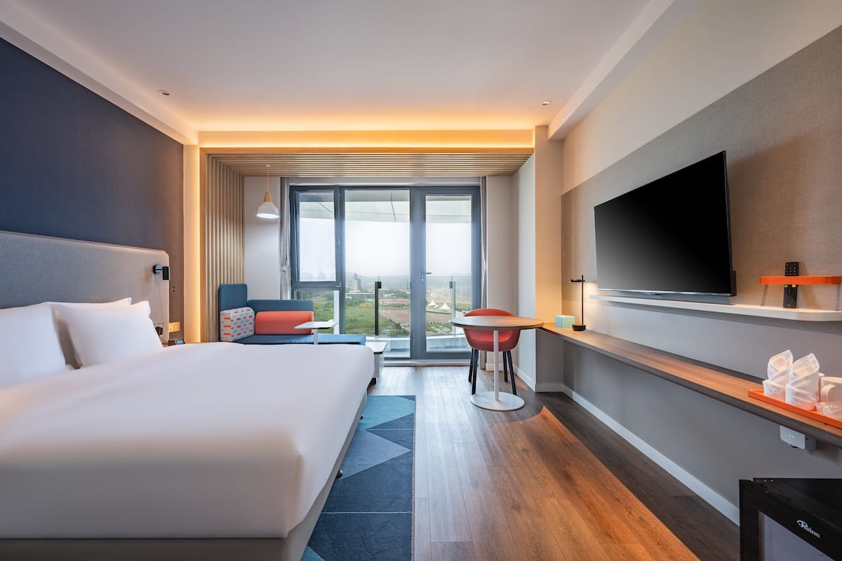 Standaard kamer, 1 kingsize bed, uitzicht op zee (Extra Floor Space) | Een minibar, geluiddichte muren, gratis wifi, beddengoed
