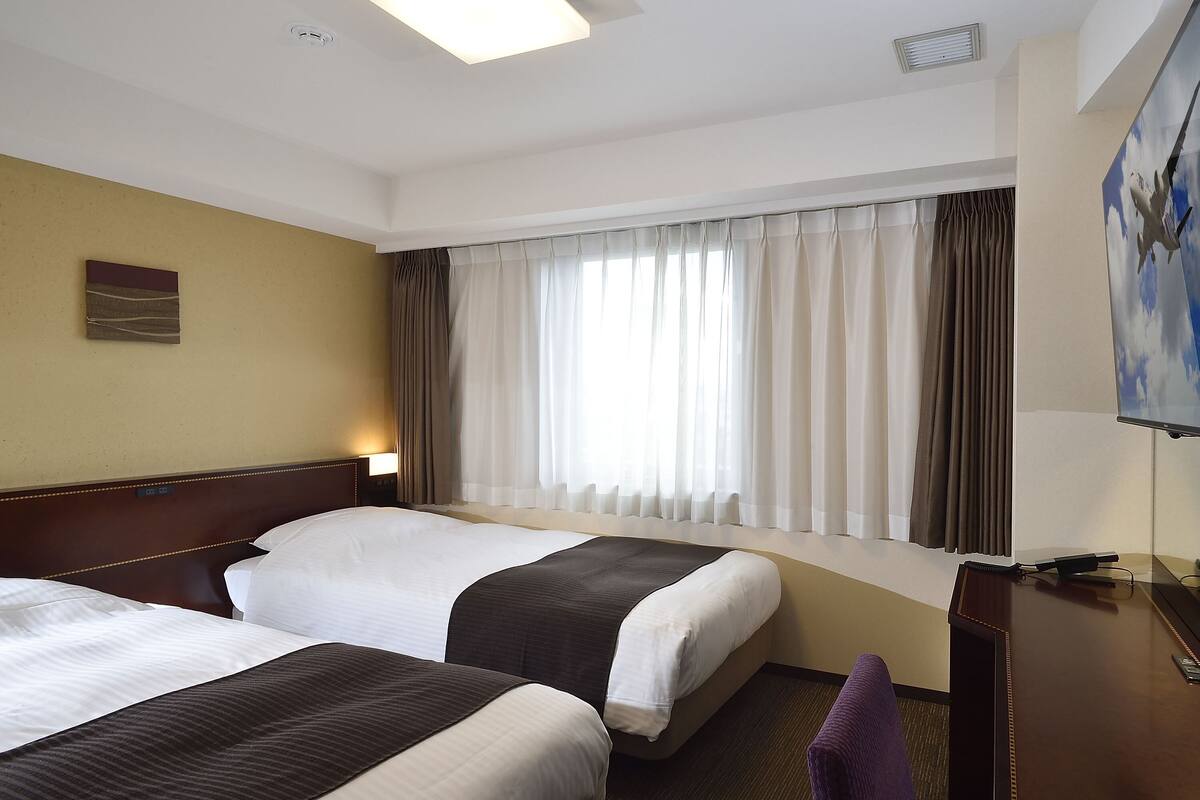 down duvets, desk, laptop workspace, blackout curtains