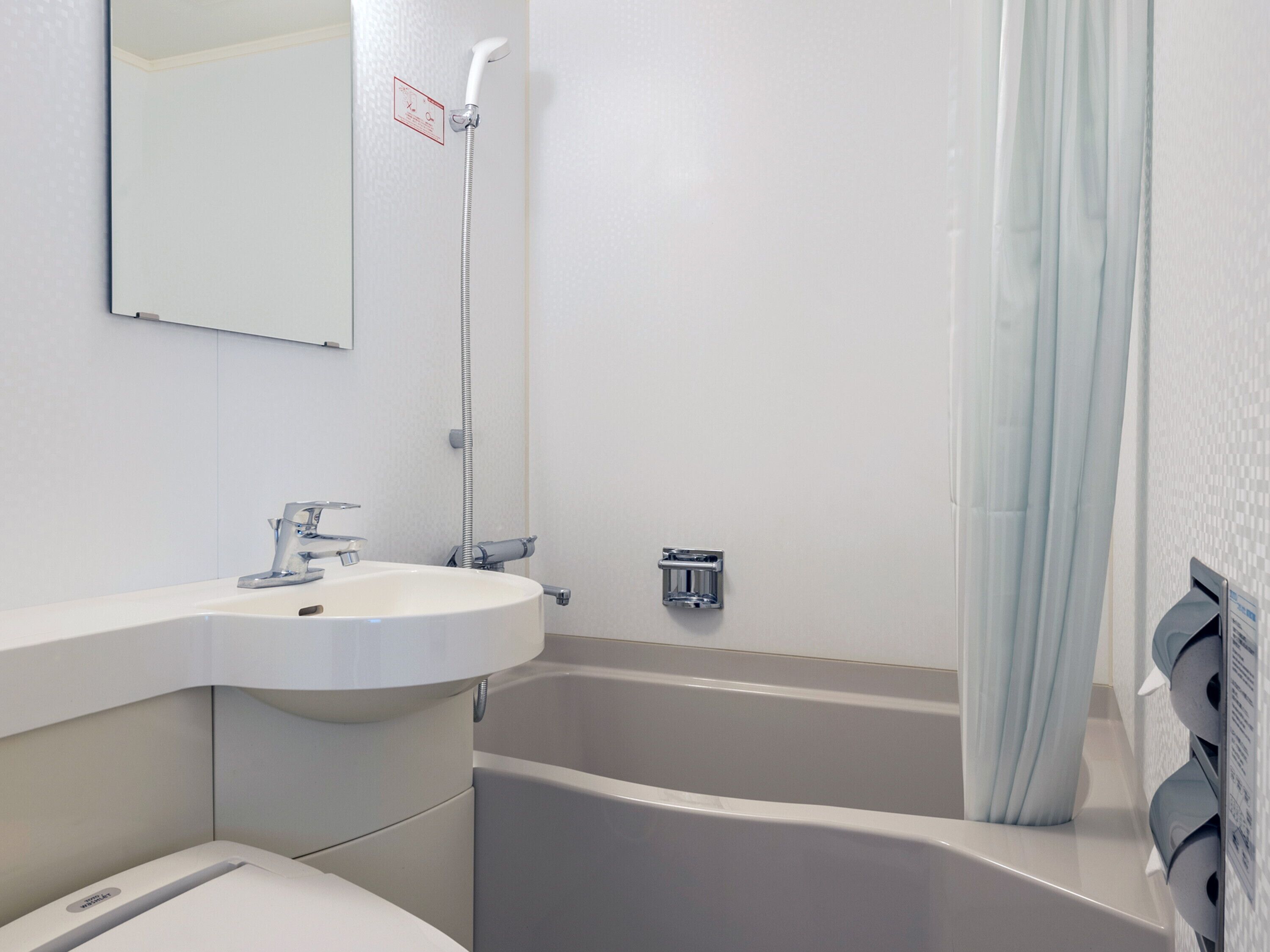 combined shower/bathtub, free toiletries, hair dryer, bathrobes