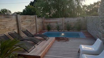 Alberca al aire libre y alberca climatizada