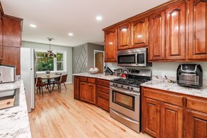 Fridge, microwave, oven, stovetop - Spacious Midcentury home located 1 block from Oaklawn Racing and Gaming (Hot Springs)