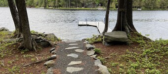 Cozy  Sebec Lake front cabin with dock and fire pit