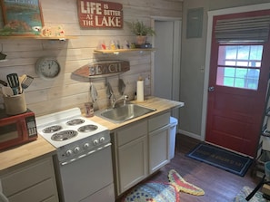 Refrigerador, microondas, horno, placa de cocina