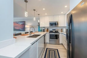 Coffee/tea maker, toaster, dining tables