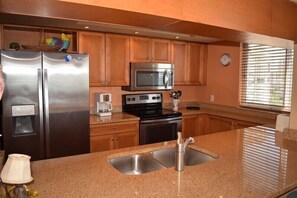 Coffee/tea maker, toaster, dining tables