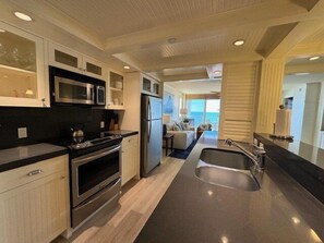 Coffee/tea maker, toaster, dining tables