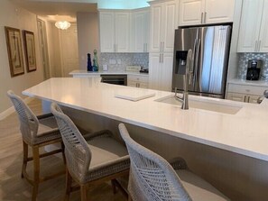 Coffee/tea maker, toaster, dining tables